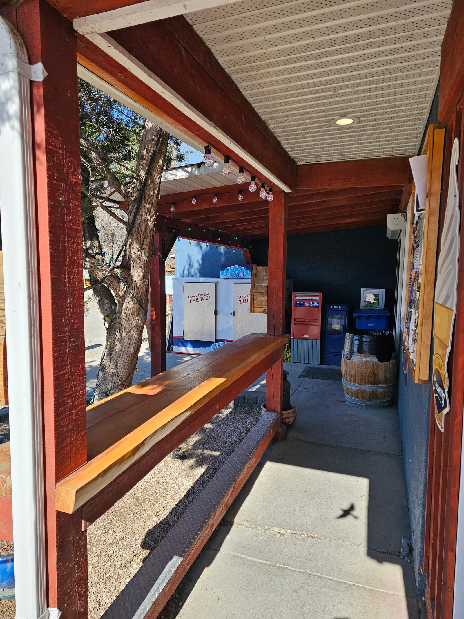 The covered Lu Lou's service porch and order window, the first beach grill you hit driving north from Kelowna airport